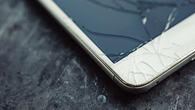 A smartphone with a cracked screen